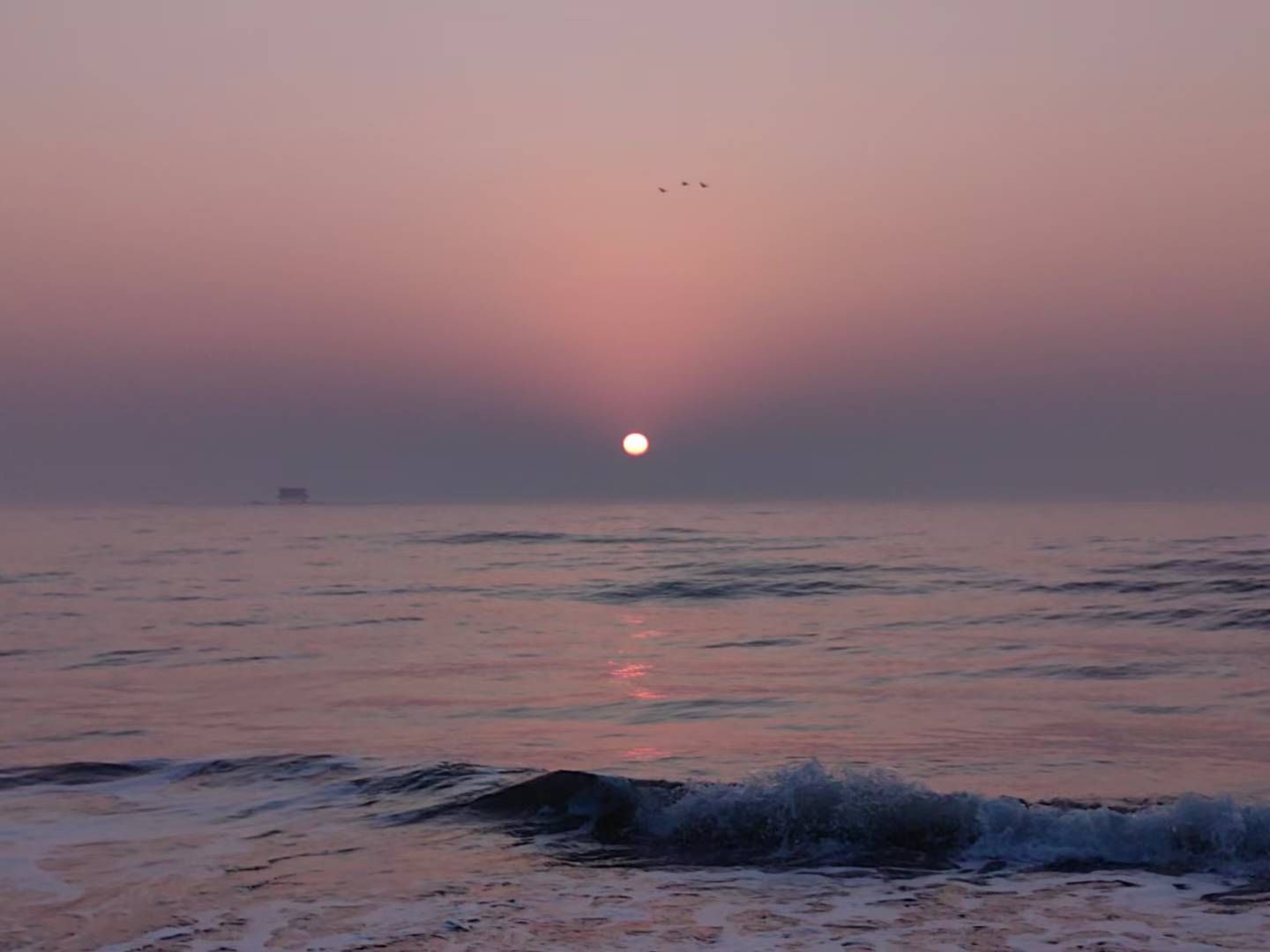 Sunset above a calm sea
